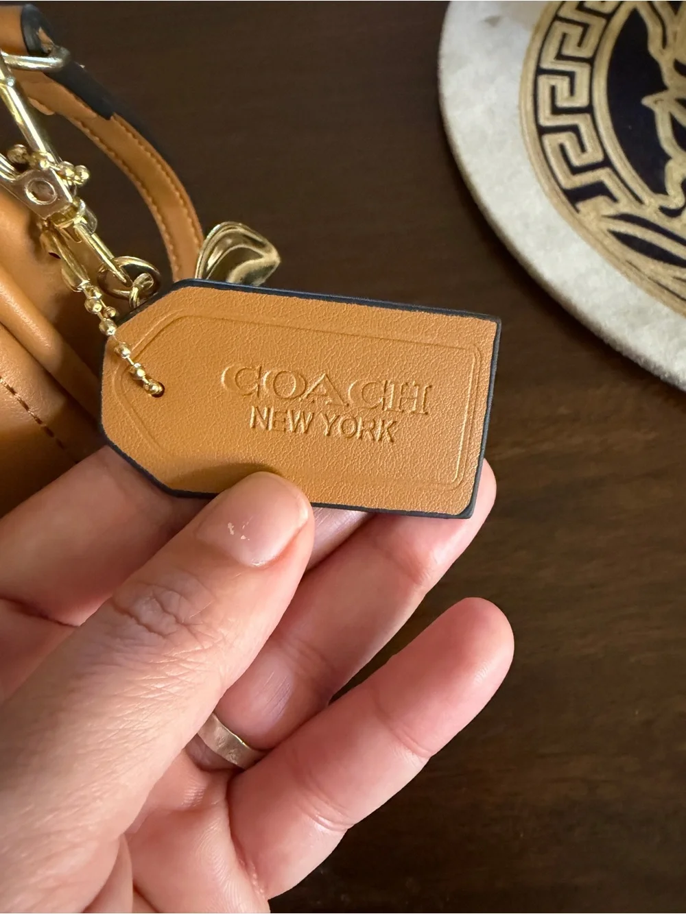 Coach Tan Quilted Crossbody Bag with Cherry Charm